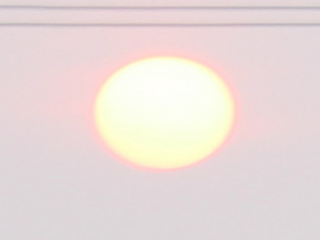 Sol aparece envolto pela fumaça das queimadas neste sábado em Tupanciretã 