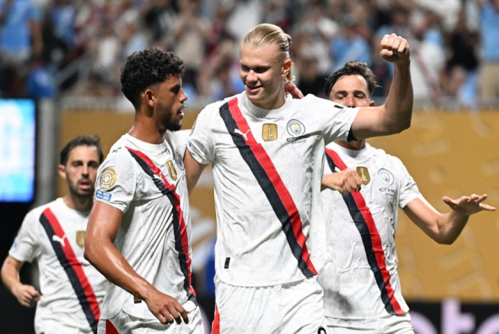 City goleia Al-Ain, garante vaga na pr�xima fase do Mundial, mas chega para duelo decisivo atr�s da Juventus.