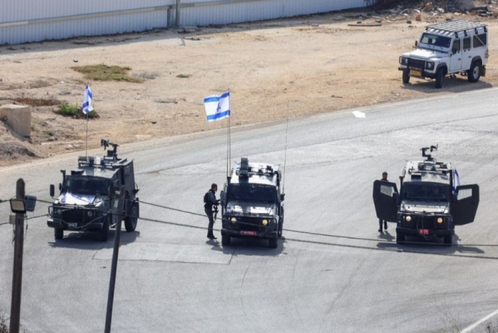 Hamas entrega corpos de quatro ref�ns mortos a Israel em meio a cessar-fogo mediado pelos EUA.