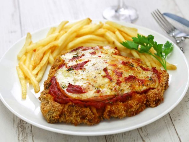 Milanesa Napolitana: delicioso prato servido no Own Montevideo