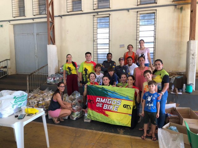 POLCIA MILITAR EM PARCERIA COM O PROJETO AMIGOS DE BIKE REALIZAM AO SOCIAL DE NATAL